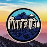 2.85" WANDERLUST White Clouds Floating Above Deep Blue Ocean Waves Amidst Blue Mountains FULLY EMBROIDERED Round Patch with Choice of Backing