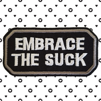 3.03"x1.54" EMBRACE THE SUCK White Stitching on Black Twill with Grey Stitched Border Embroidered Patch with Choice of Backing