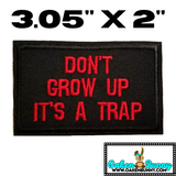 3.05"x2" DON'T GROW UP IT'S A TRAP Red Stitching on Black Twill Embroidered Patch with Choice of Backing