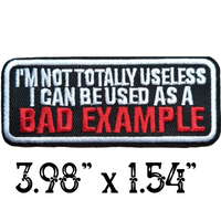 3.98"x1.54" I'M NOT TOTALLY USELESS I CAN BE USED AS A BAD EXAMPLE White & Red Stitching on Black Twill Embroidered Patch with Choice of Backing