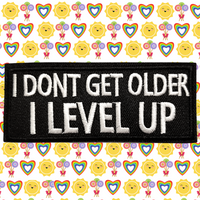 4"x1.60" I DON'T GET OLDER I LEVEL UP White Stitching Embroidered Patch with Choice of Backing